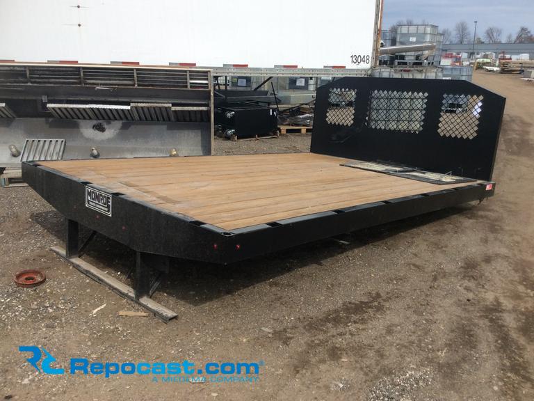 New Monroe truck equipment flat bed, 8...