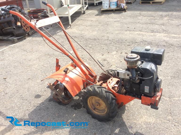 Ariens tiller with 7hp engine.