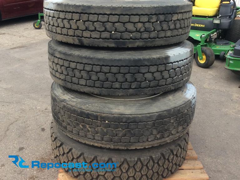 Lot of (4) semi truck drive tires on...