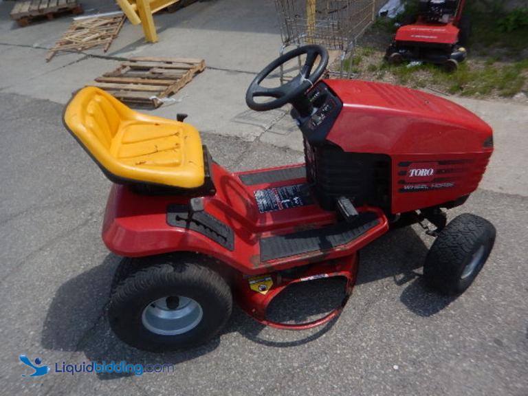 LiquidBidding Toro Wheel Horse Riding Lawn Mower. 38...