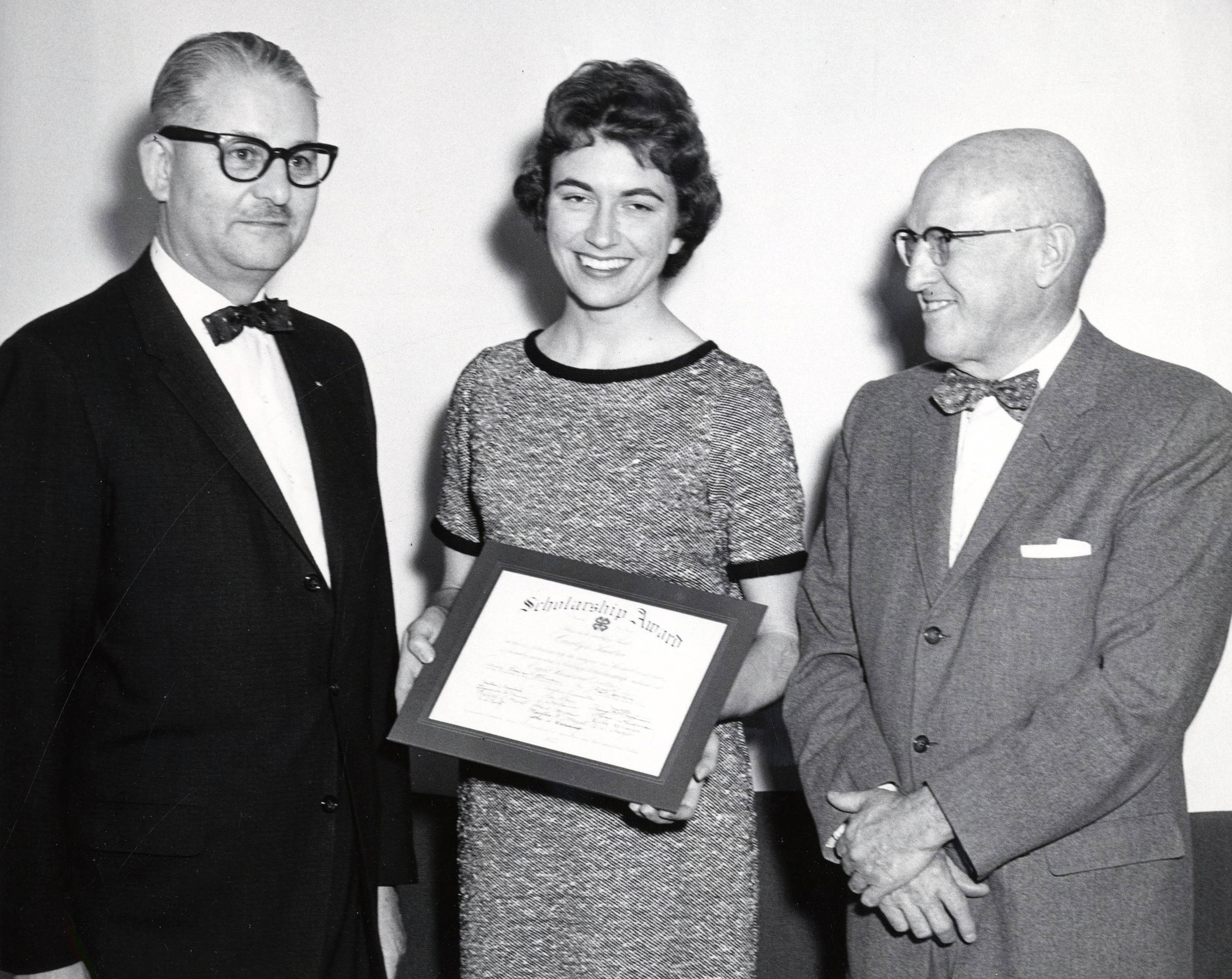 Carolyn Rae Kudlac, center, University of Idaho student in Home