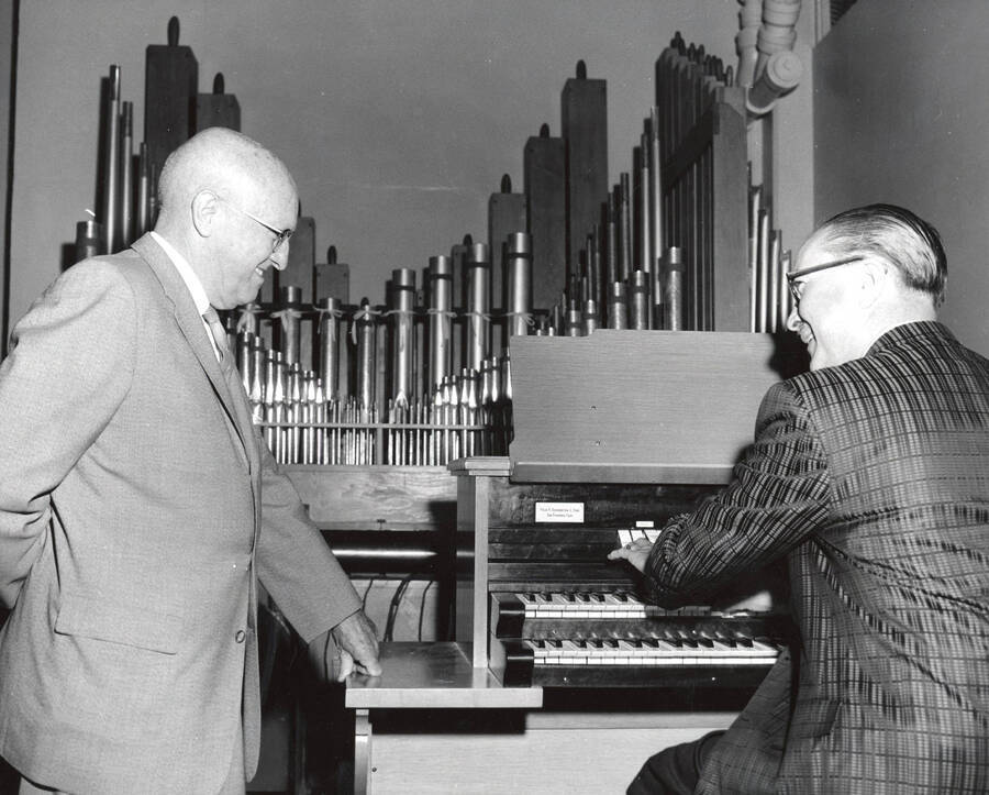 President Theophilus and Hall Macklin with new practice organ