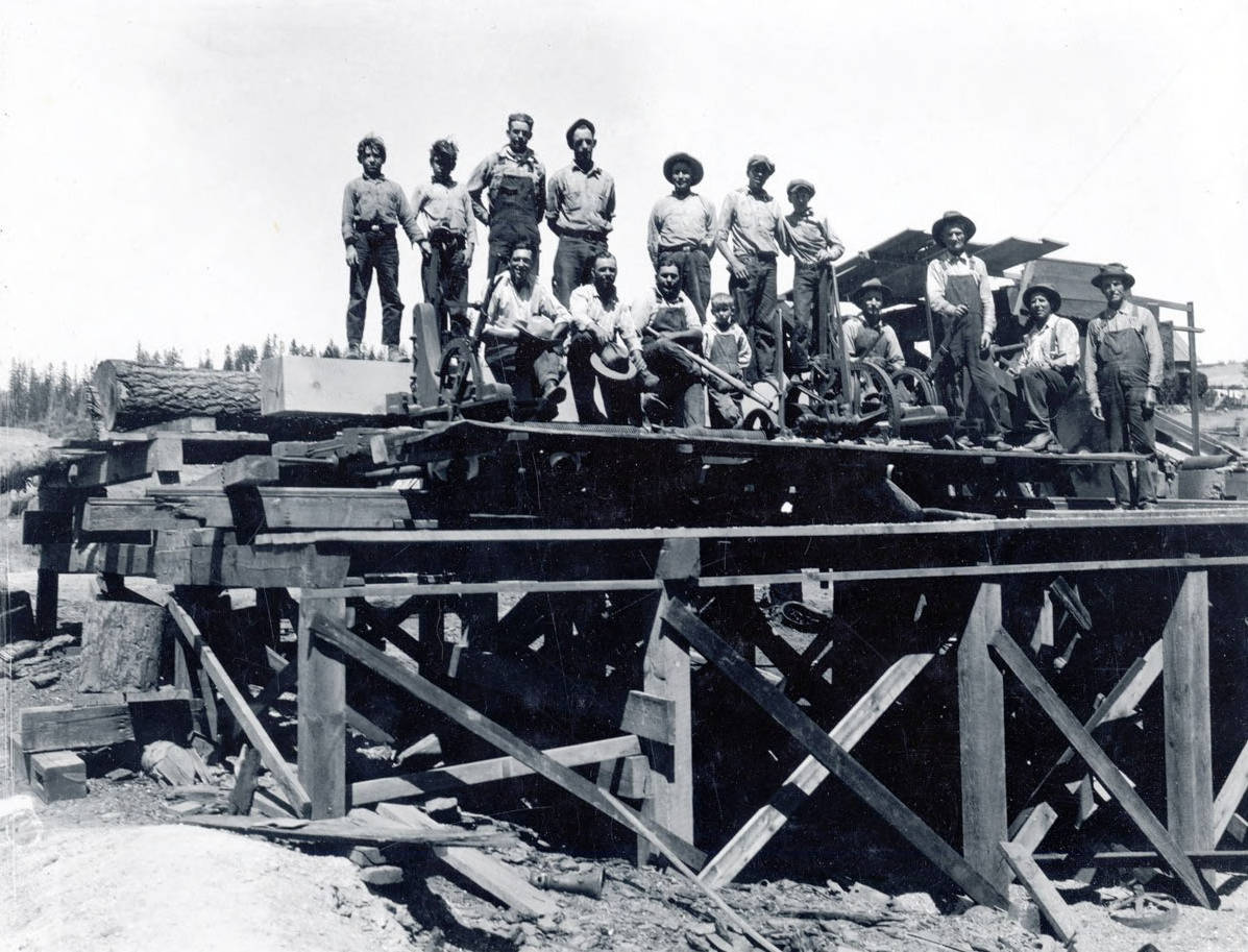 Group of men working on a bridge? Troy, Idaho? Idaho Cities and Towns