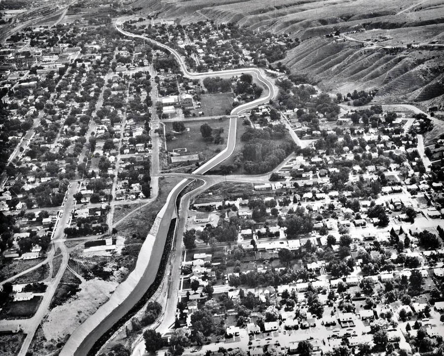 Aerial view showing artist's conception of flood control project, looking upstream on Portneuf