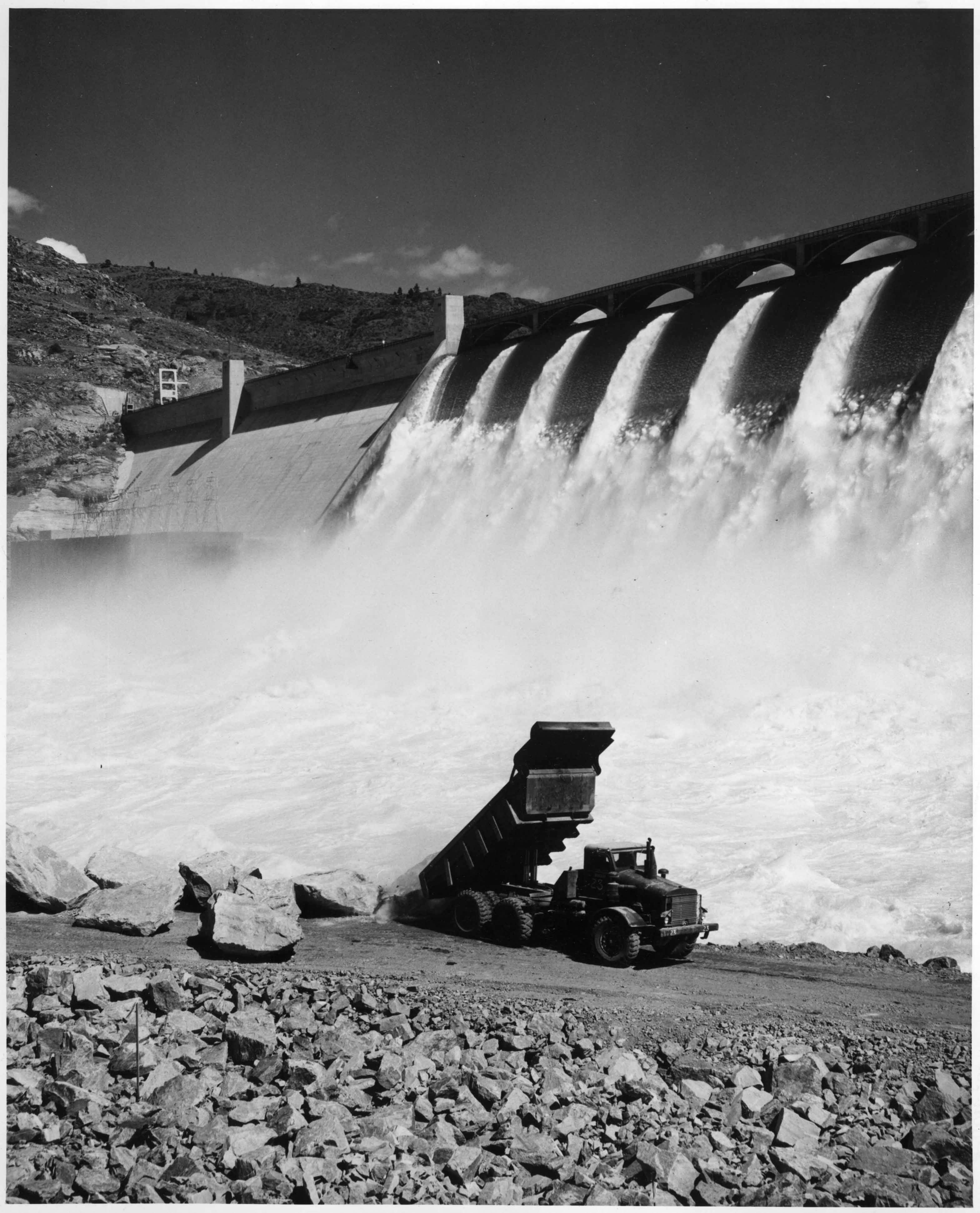 Eucluid Truck Dumps Granite In Front Of Grand Coulee (Equipment for