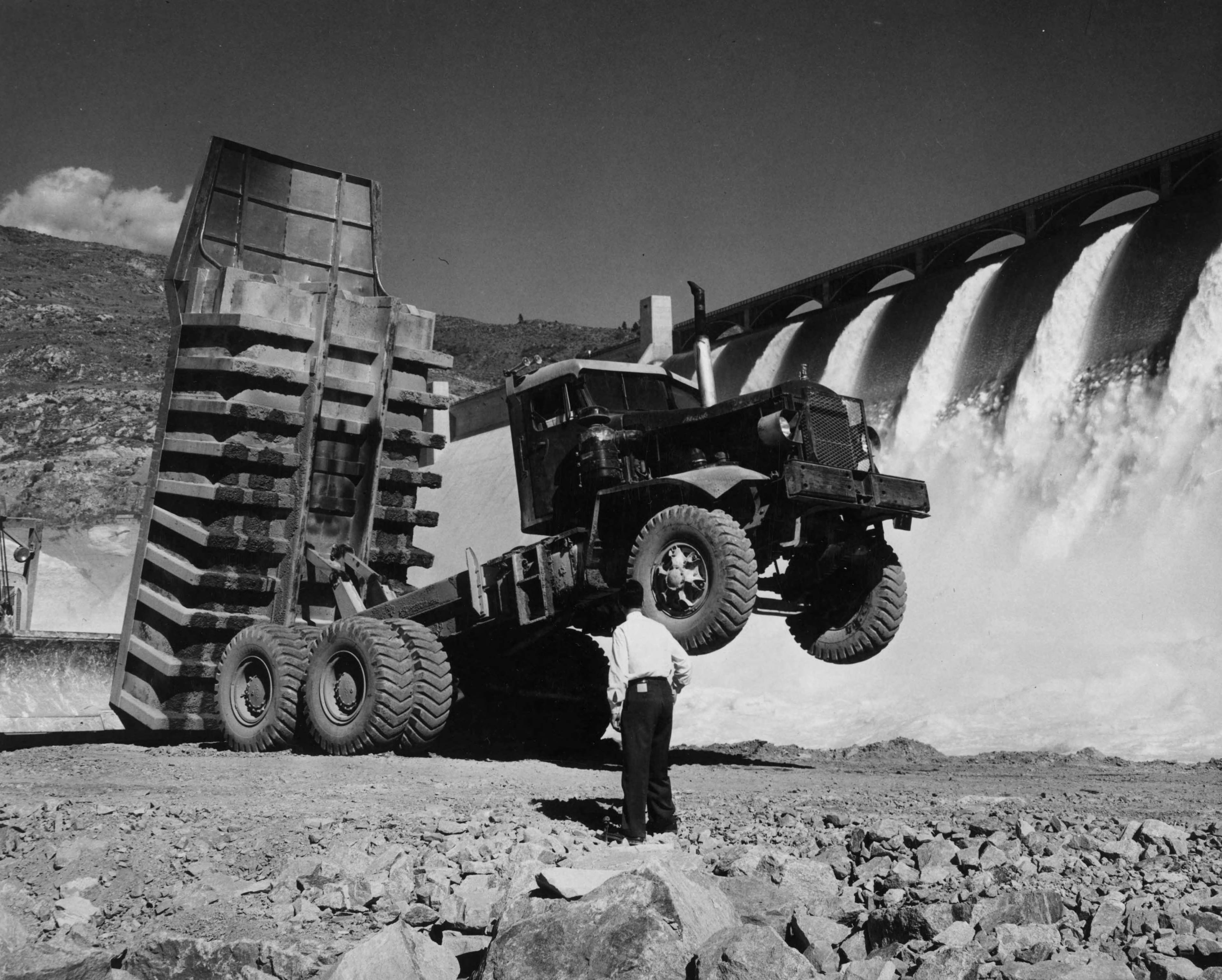 Eucluid Truck Dumps Granite In Front Of Grand Coulee (Equipment for