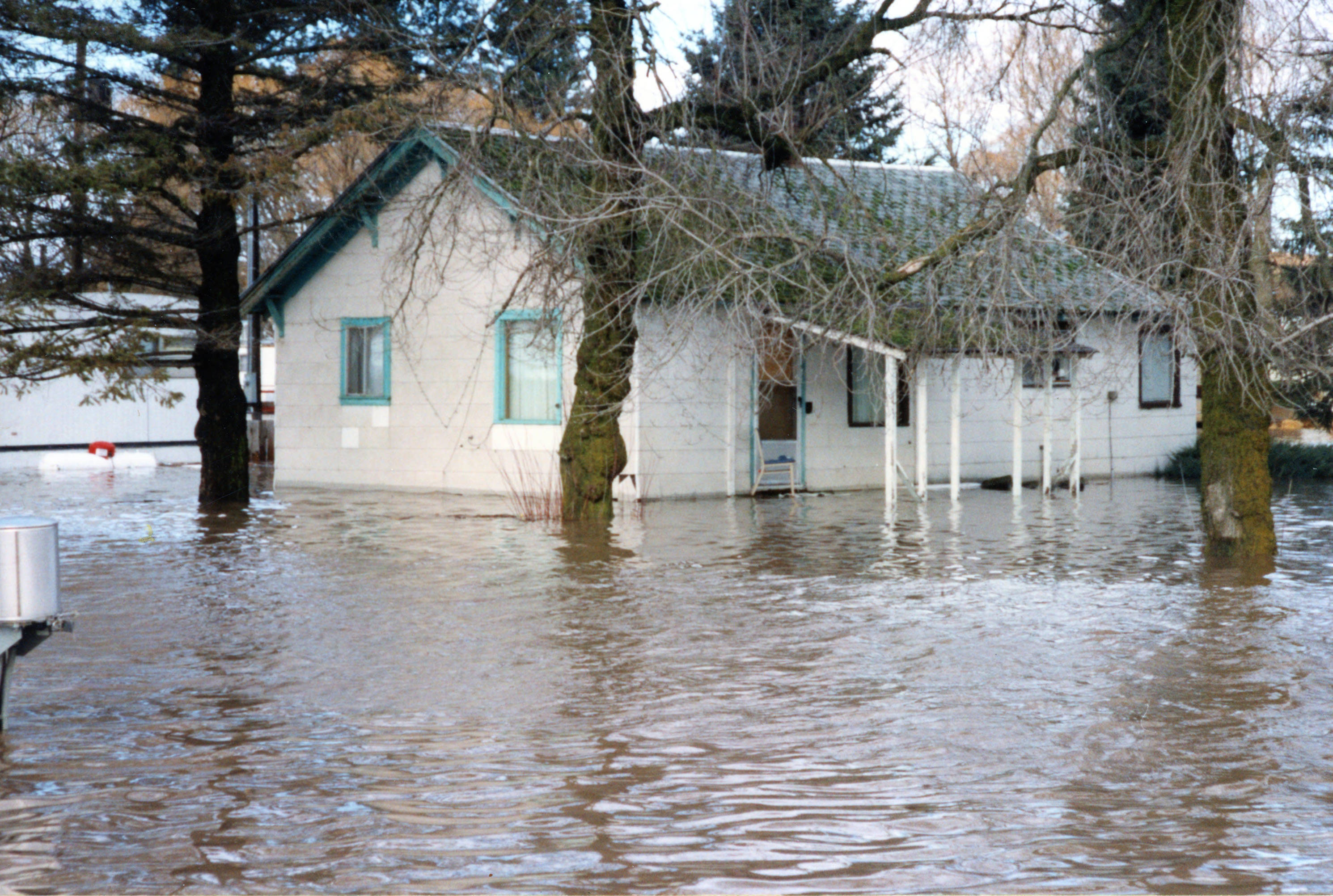 Home underwater from a flood on the Palouse River Potlatch Historical