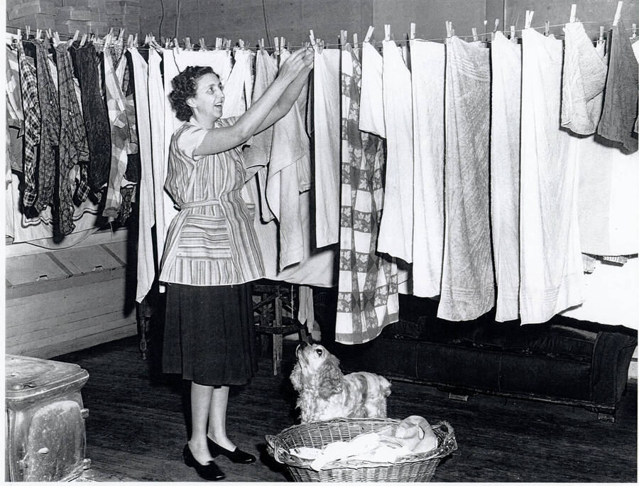 Margaret Bull hangs laundry in the Princeton Post Office Potlatch