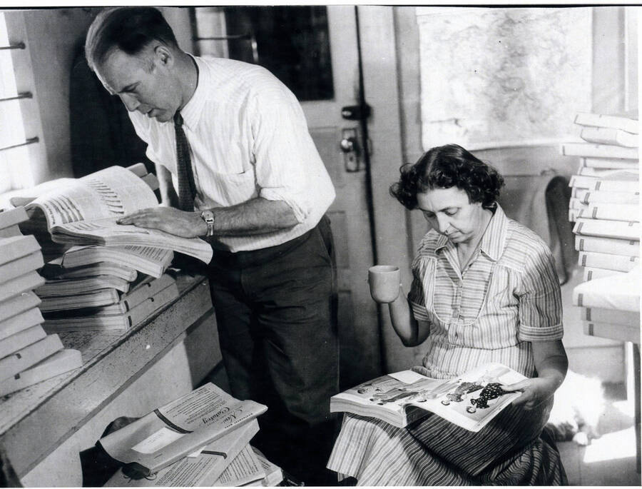 Alec and Margaret Bull looking at the newest Sears Roebuck catalog at