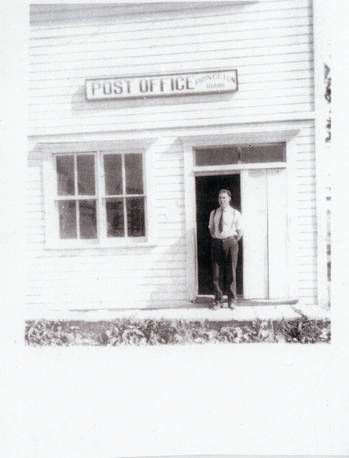 Alec Bull in front of the Princeton Post Office Potlatch Historical