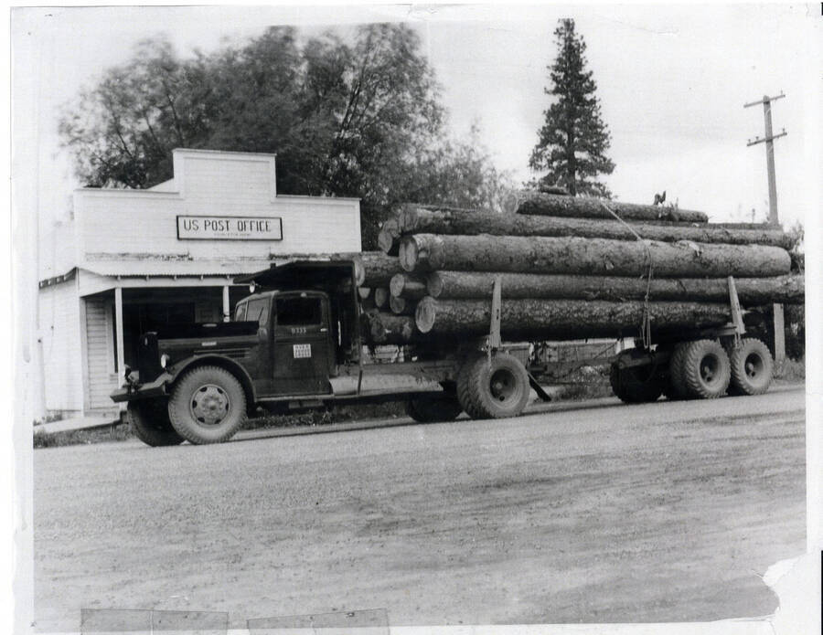 Truck with logs stopped at Princeton on way to Potlatch Mill Potlatch