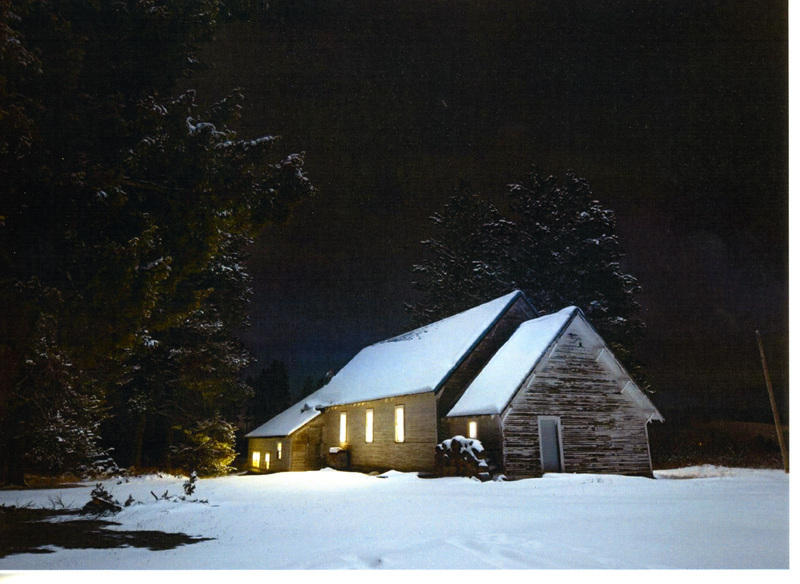 Mountain Home Grange at night in Winter Potlatch Historical Society