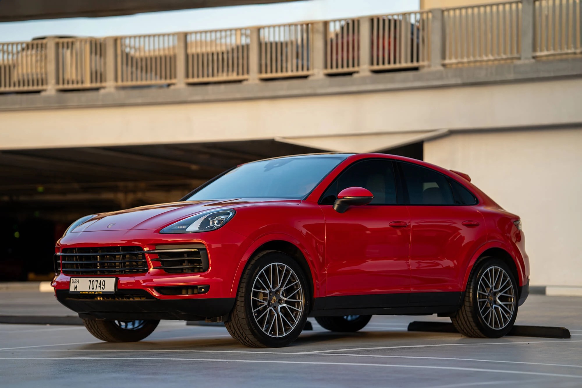 Rent Porsche Cayenne Coupe Red in Dubai SUV Octane Luxury Car
