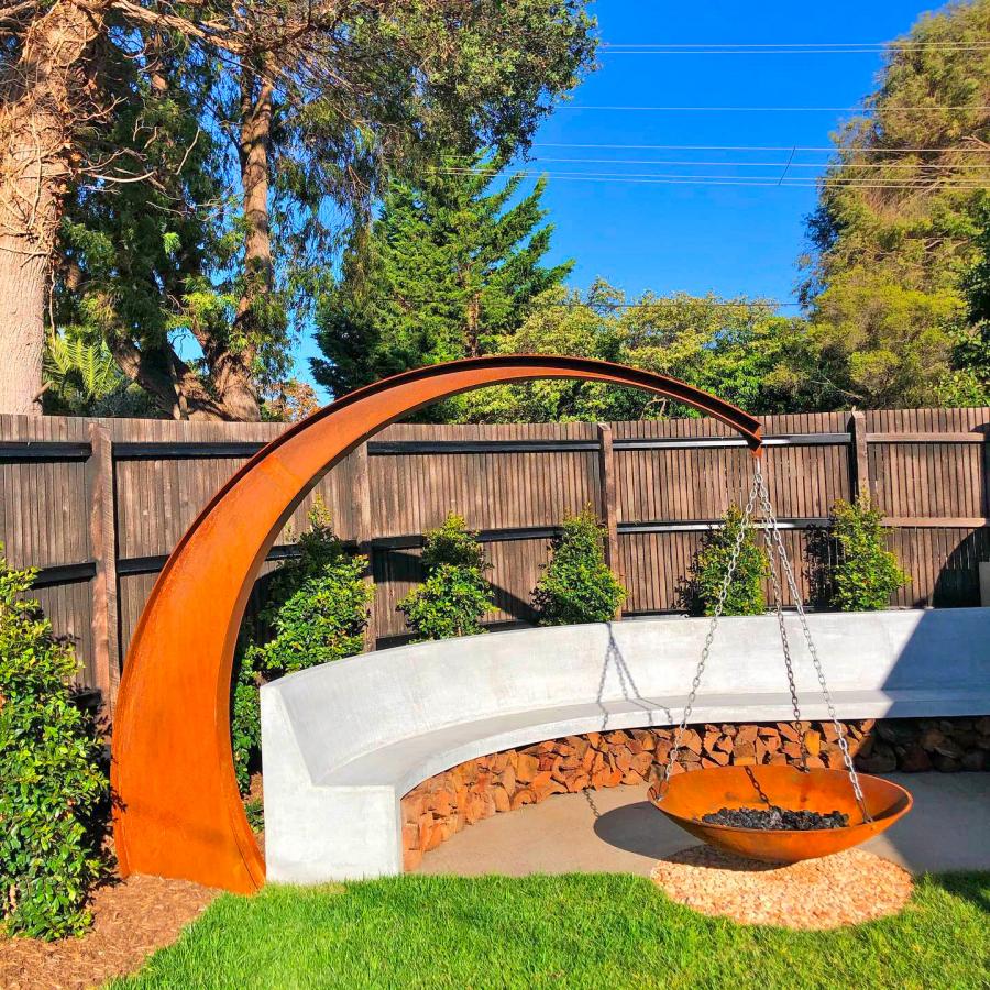 This Hanging Fire Pit Is Held Up With A Giant Arching Metal Beam Blog