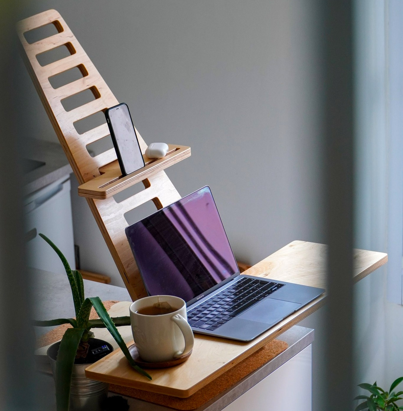 This Wooden Laptop Stand Converts Your Existing Desk Into an AnyHeight