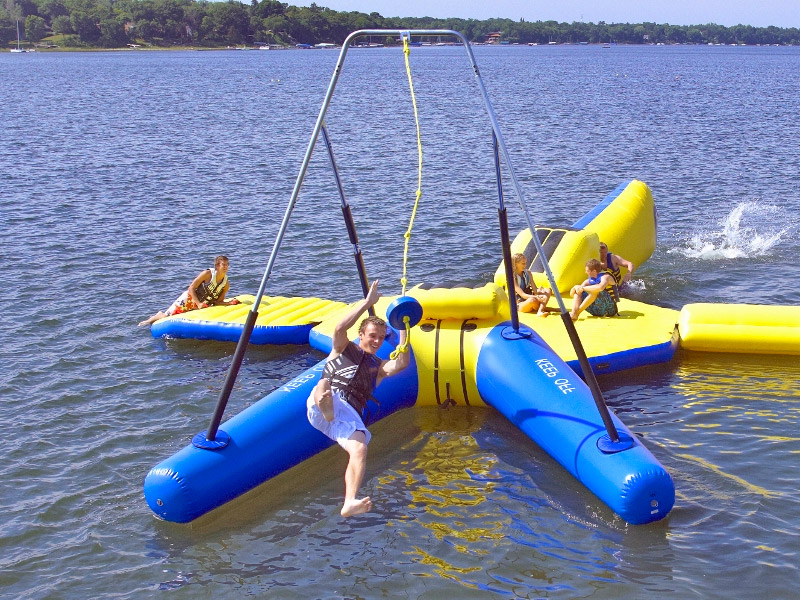 This Inflatable Floating Rope Swing Is a Must For Lake Property Owners