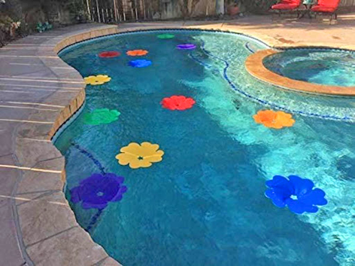 These Solar Pool Flowers Absorb Sunlight To Heat Up Your Pool Water