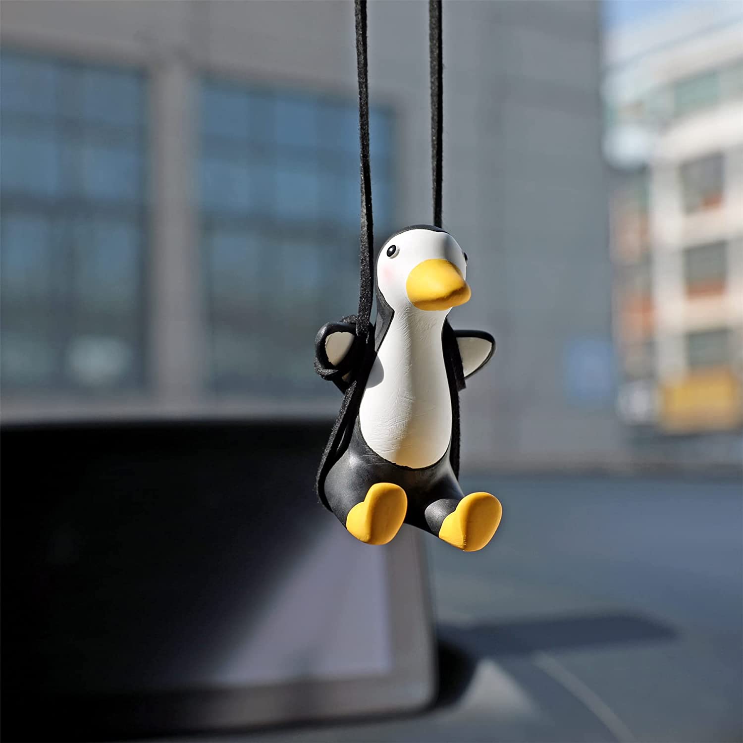 These Swinging Car Ducks Are The Ultimate Way To Relax In Traffic