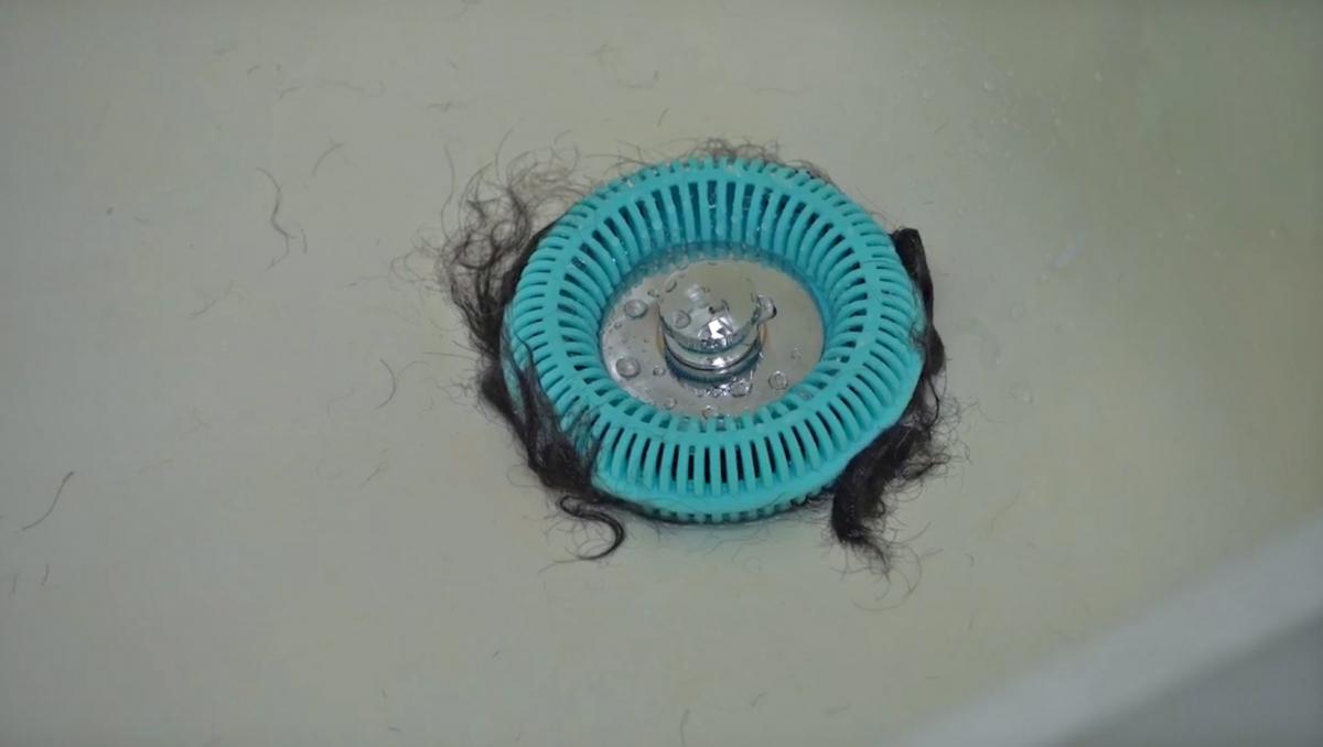 The Tub Ring Wraps Around Your Drain To Instantly Catch Every Hair