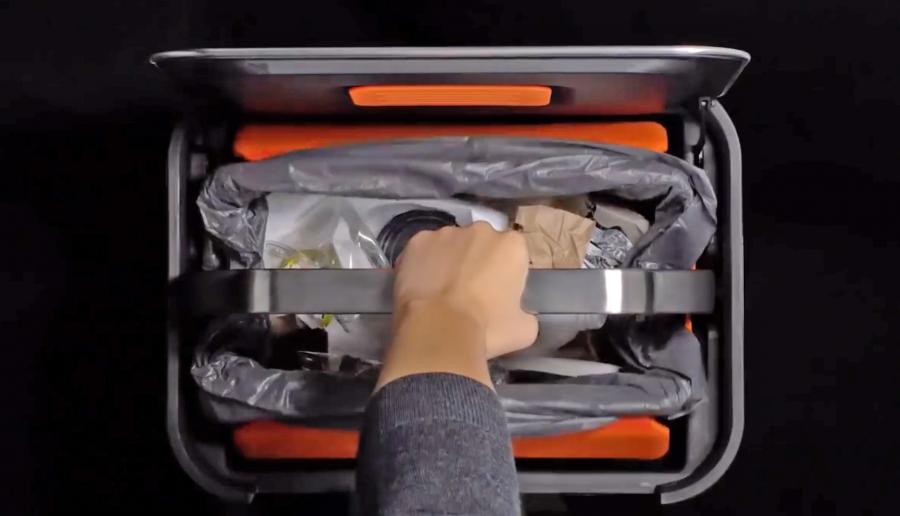 This Manual Trash Compactor Bin Holds 3x The Amount Of Trash