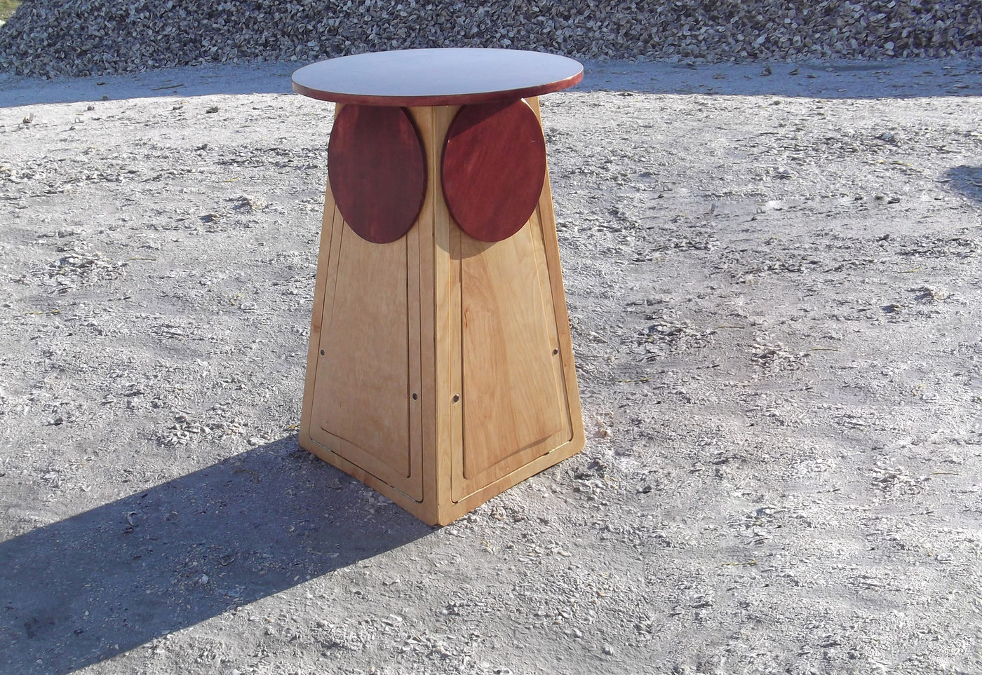 The Quad Micro Bar Table Hides Four Expandable Bar Stools Inside Of It