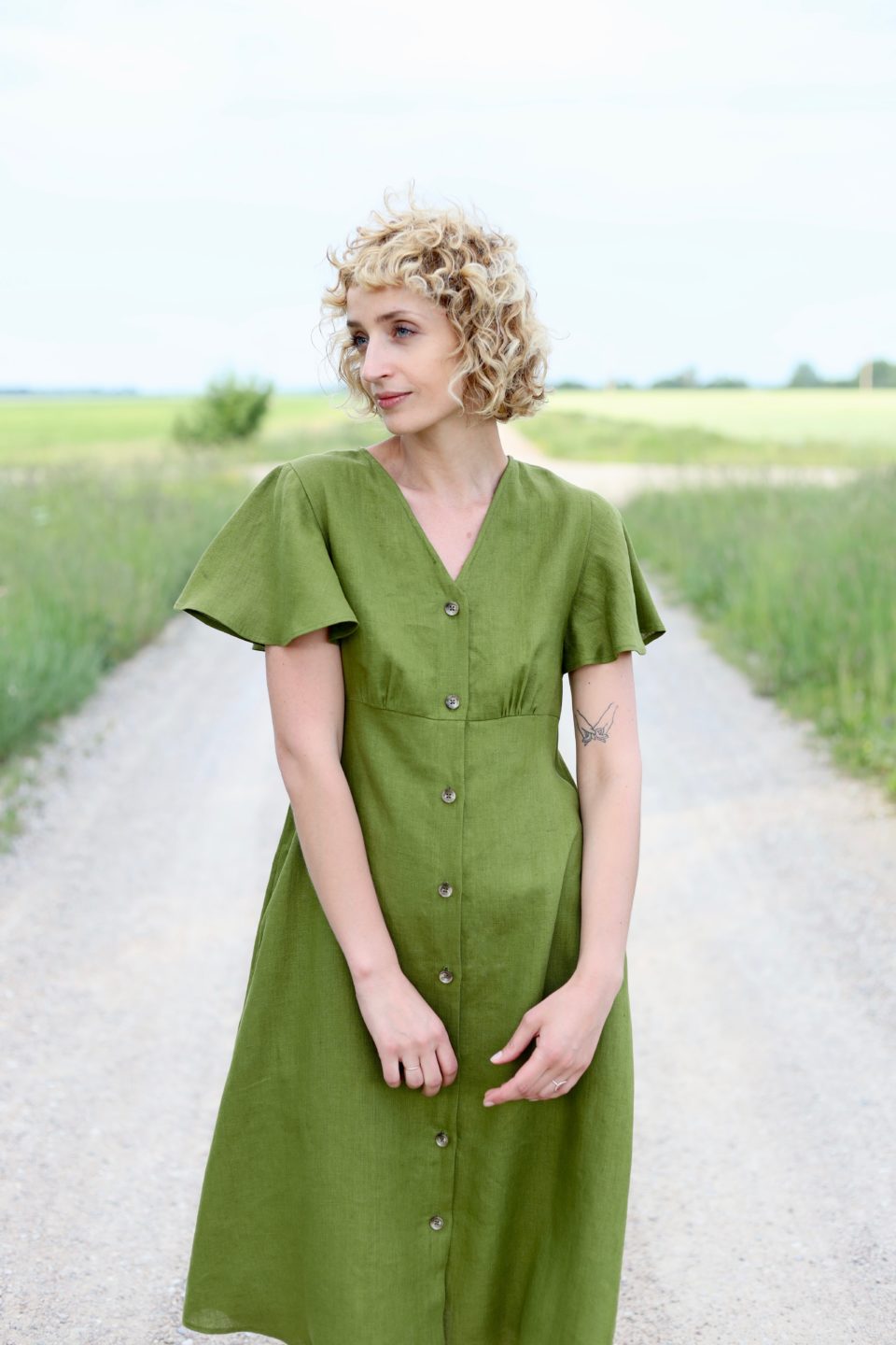 Linen dress with frill sleeves in moss green color OffOn