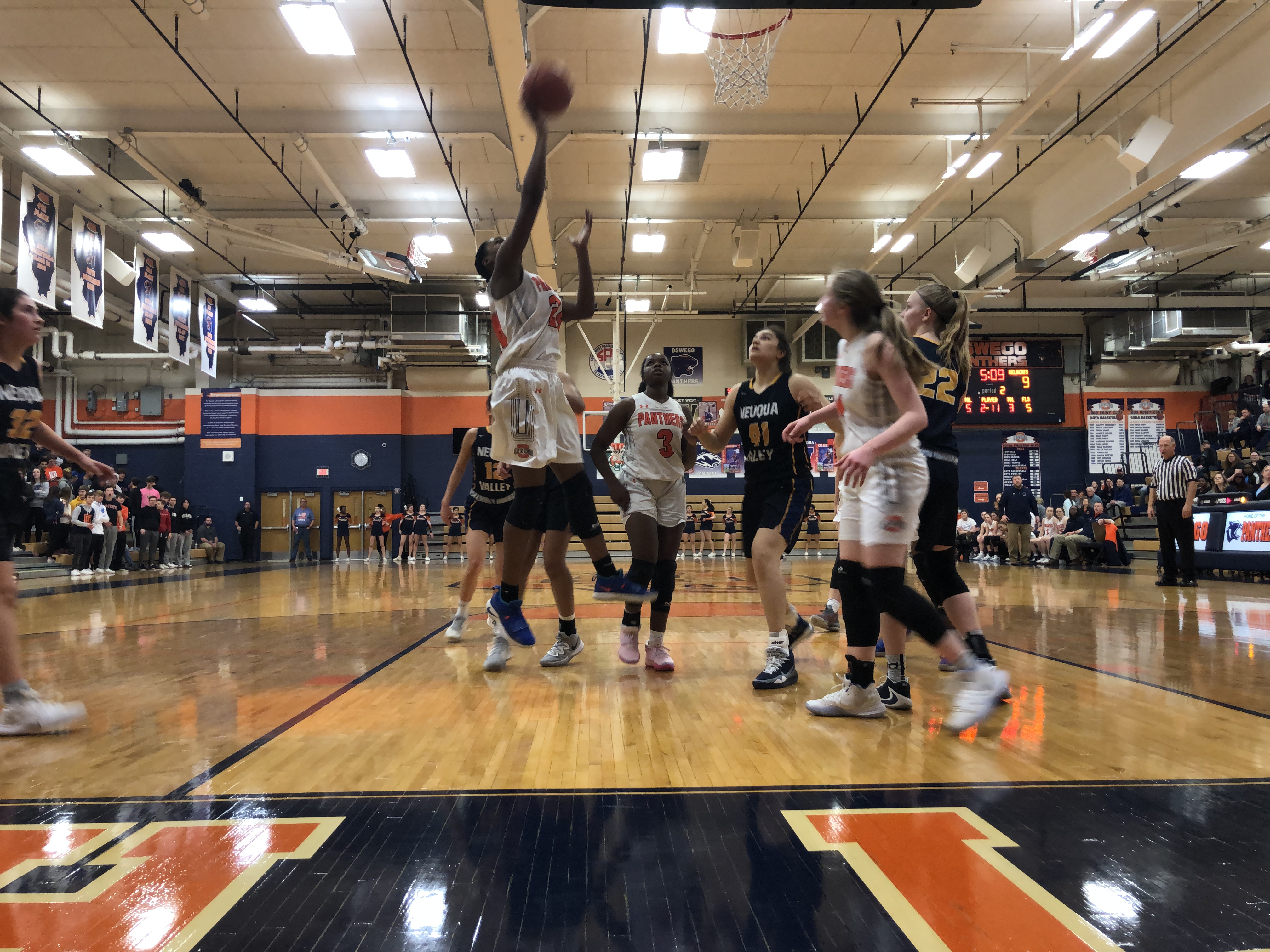 Senior Jenelle Rogers drives to the bucket for an uncontested layup.