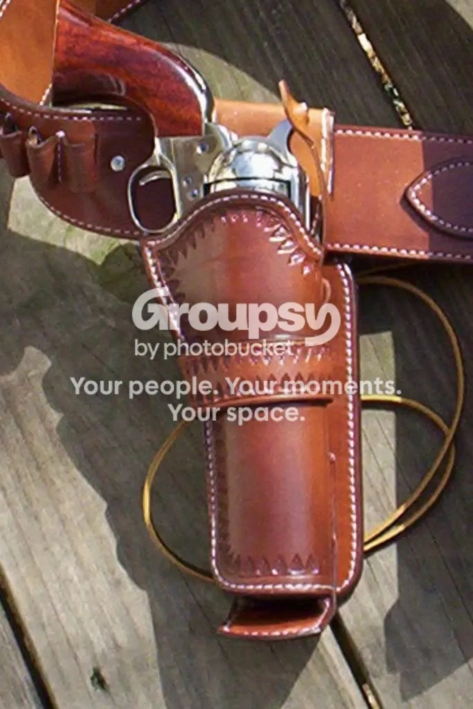 Cowboy Fast Draw Holster W/ Bullet Deflector Photo by reddogleather Photobucket