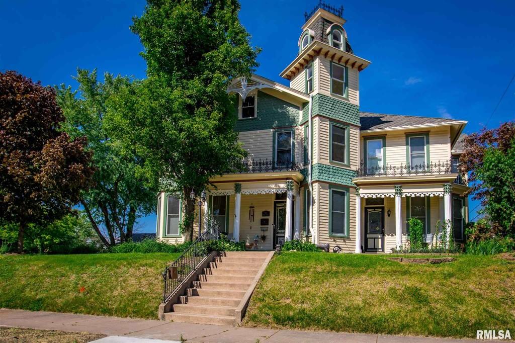 c.1870 Movein Ready Victorian Home With 2 Towers And Garage in IA