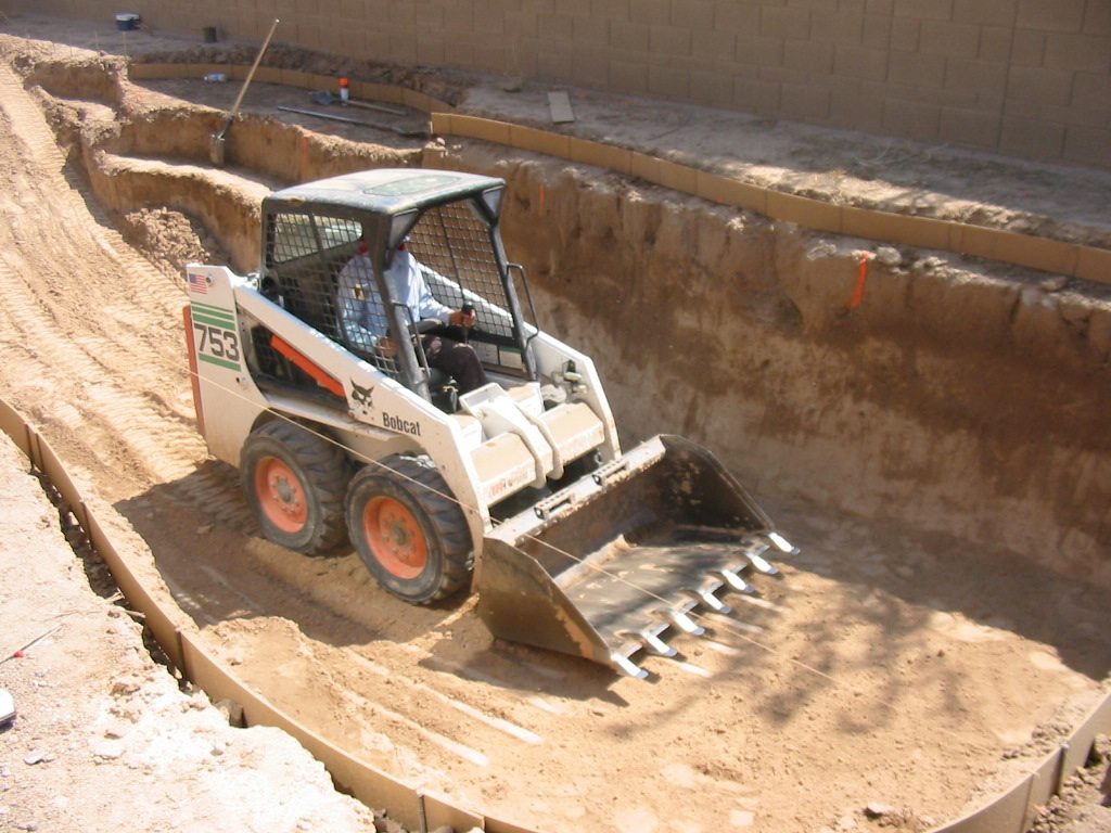 Bobcat loader Rentals Old World Pools