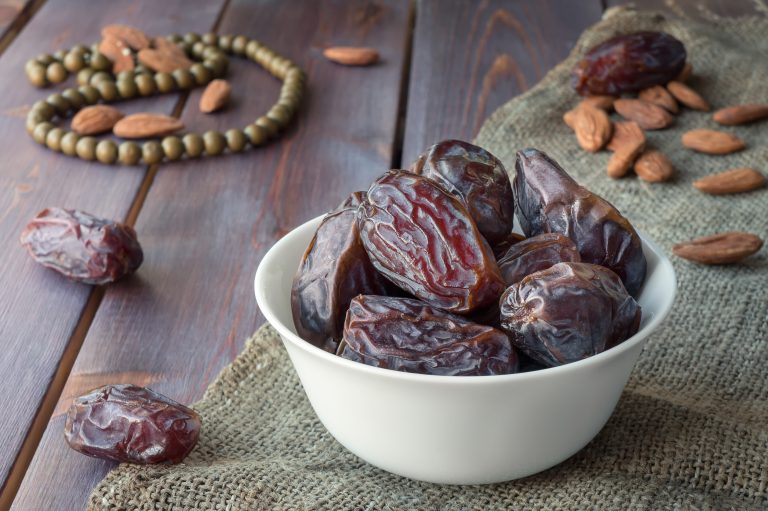 Dates fruits harvest. Traditional arabic food. Ramadan event. Olive