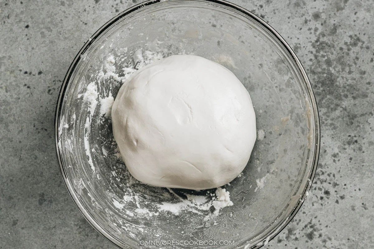 kneaded dough in a bowl