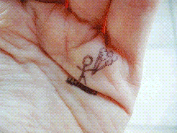 Jumping man on a trampoline tattoo