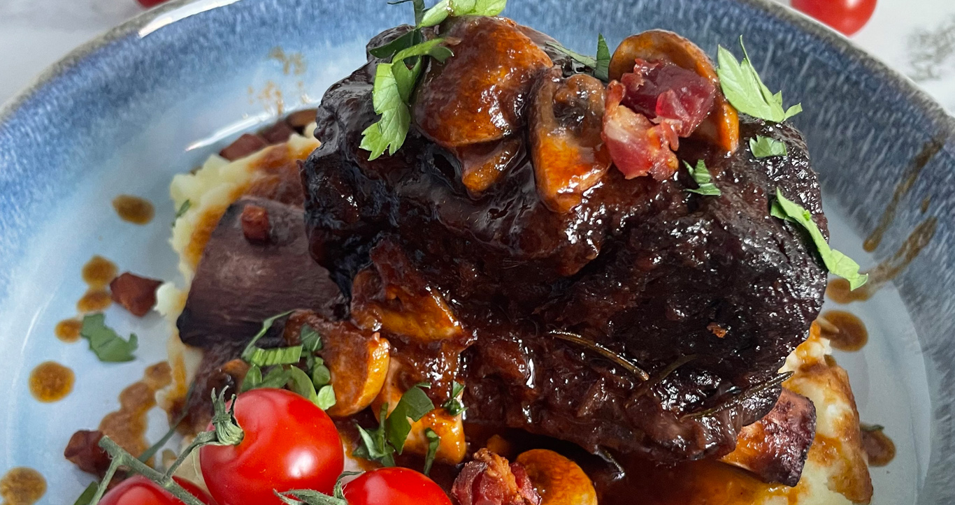 Braised Beef Short Ribs with Crispy Pancetta and Mushrooms in a Red