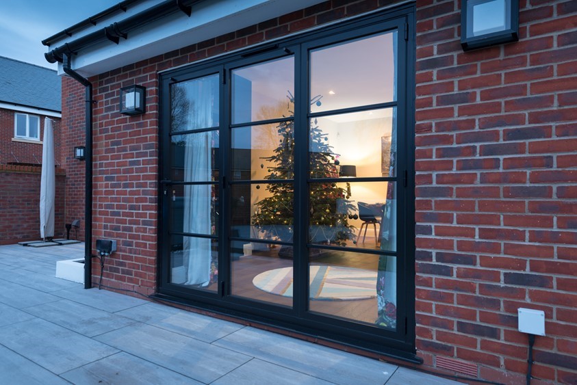 Bar OB49 Bifold Doors Complete This Couple's Stylish Home