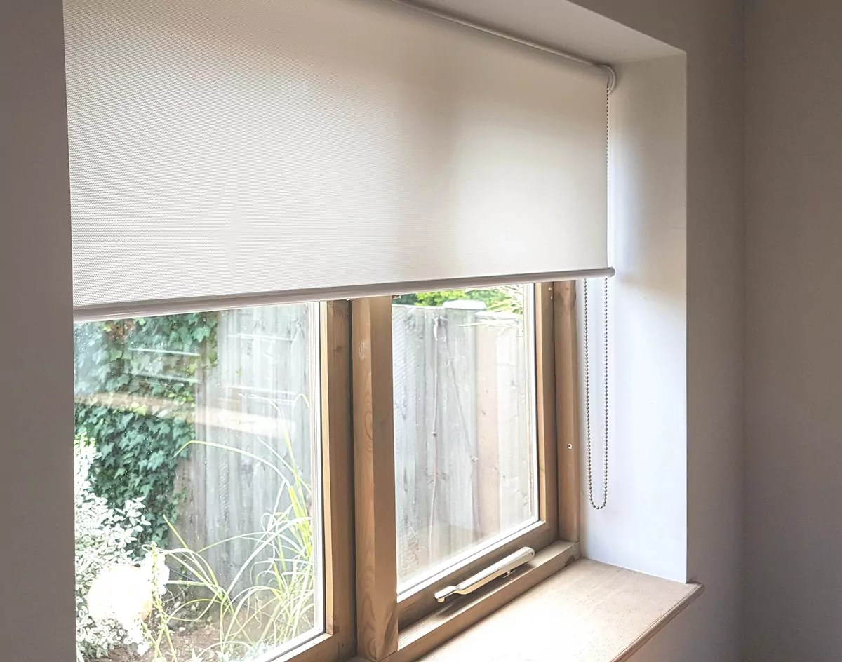 Sunscreen roller blinds reduce glare effect OTRT INTERIORS