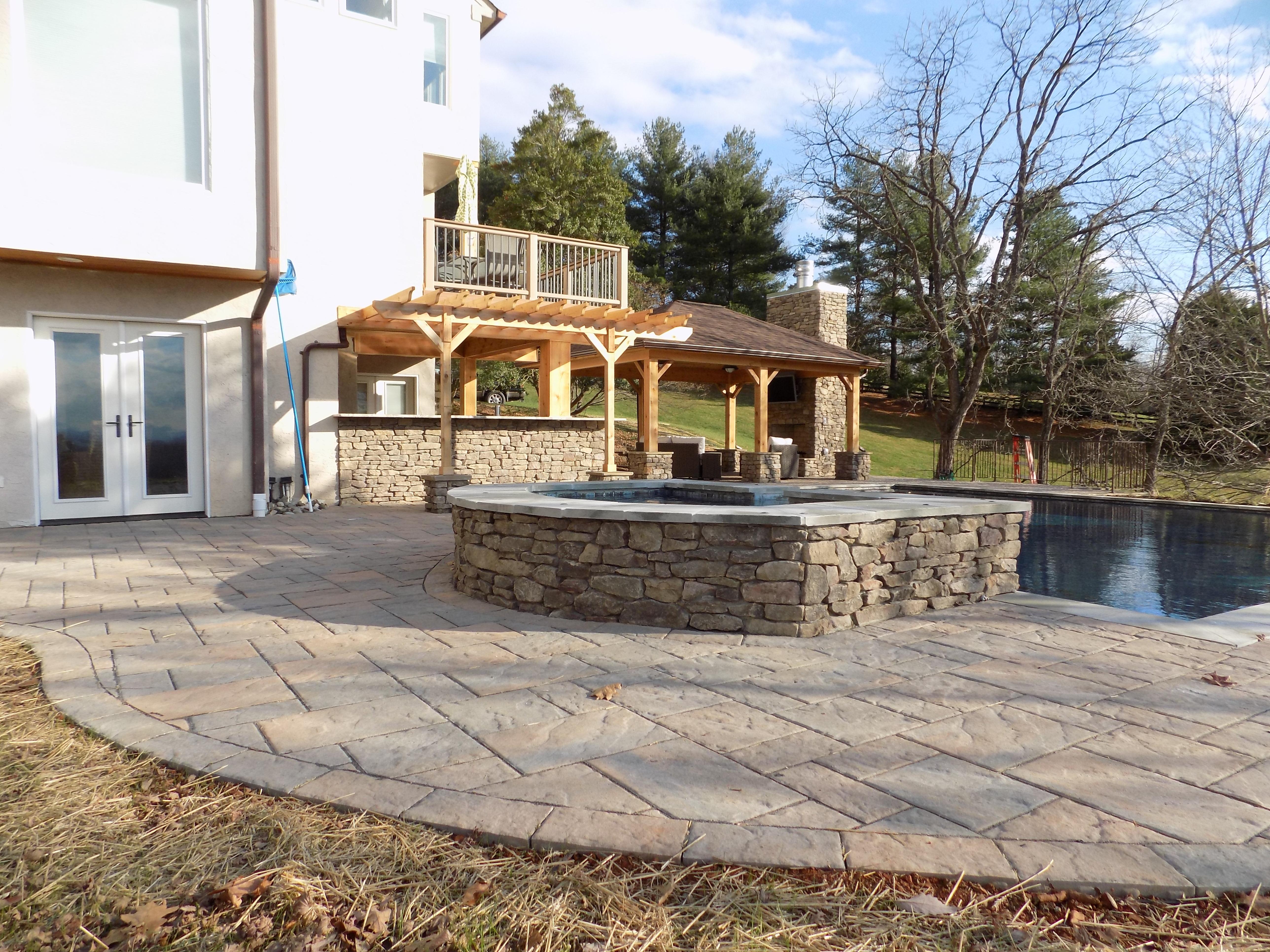 Outdoor Escapes, LLC Custom Stone Patios & Walkways