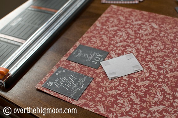 Turn Free Printables into Ornaments - this DIY Christmas Ornament is such a fun idea and could be used also as a gift tags! Love this idea! From www.overthebigmoon.com!