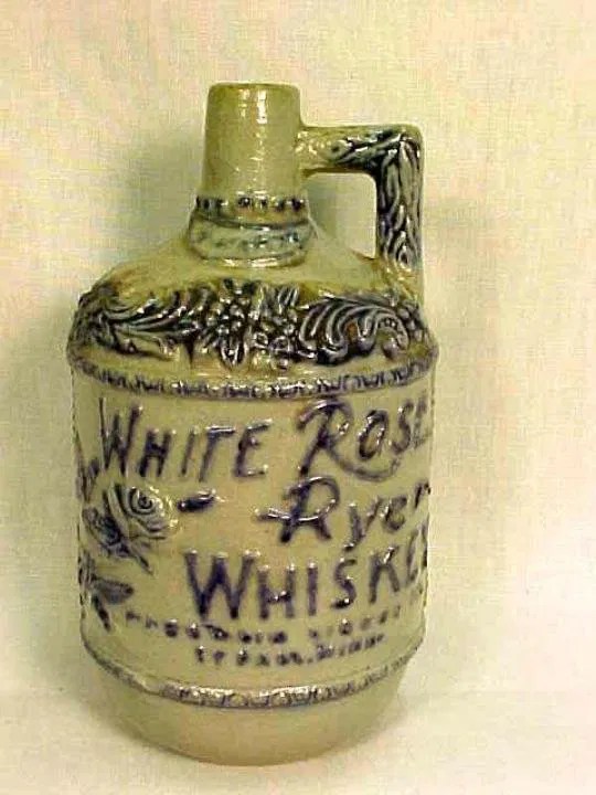 L059 WHITE ROSE RYE WHISKEY JUG Lot 59