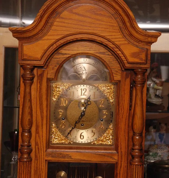 Howard Miller oak GrandFather clock, 1970's Lot 423