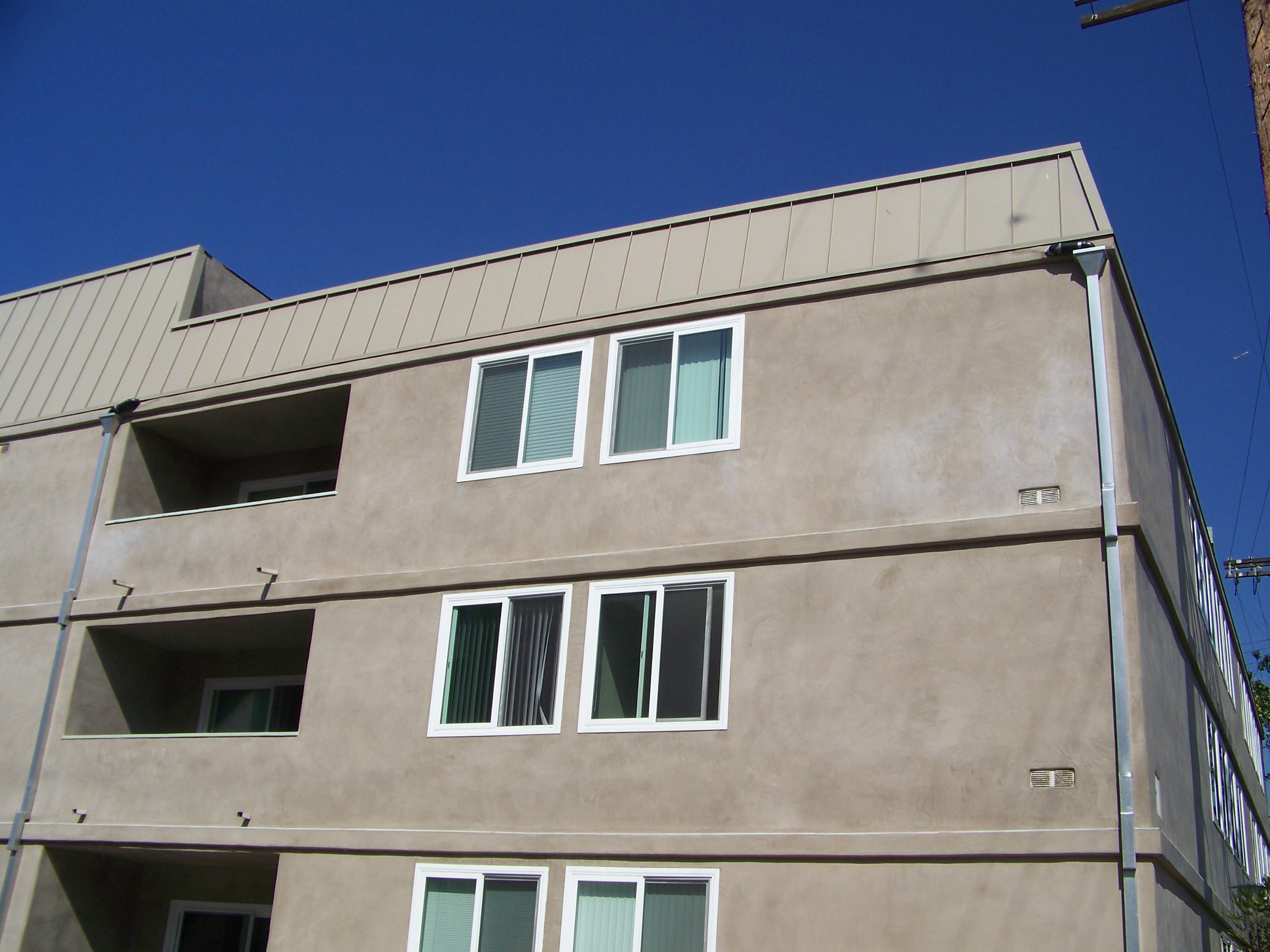 Driftwood Apartments Pacific Metal Roofing, Inc.