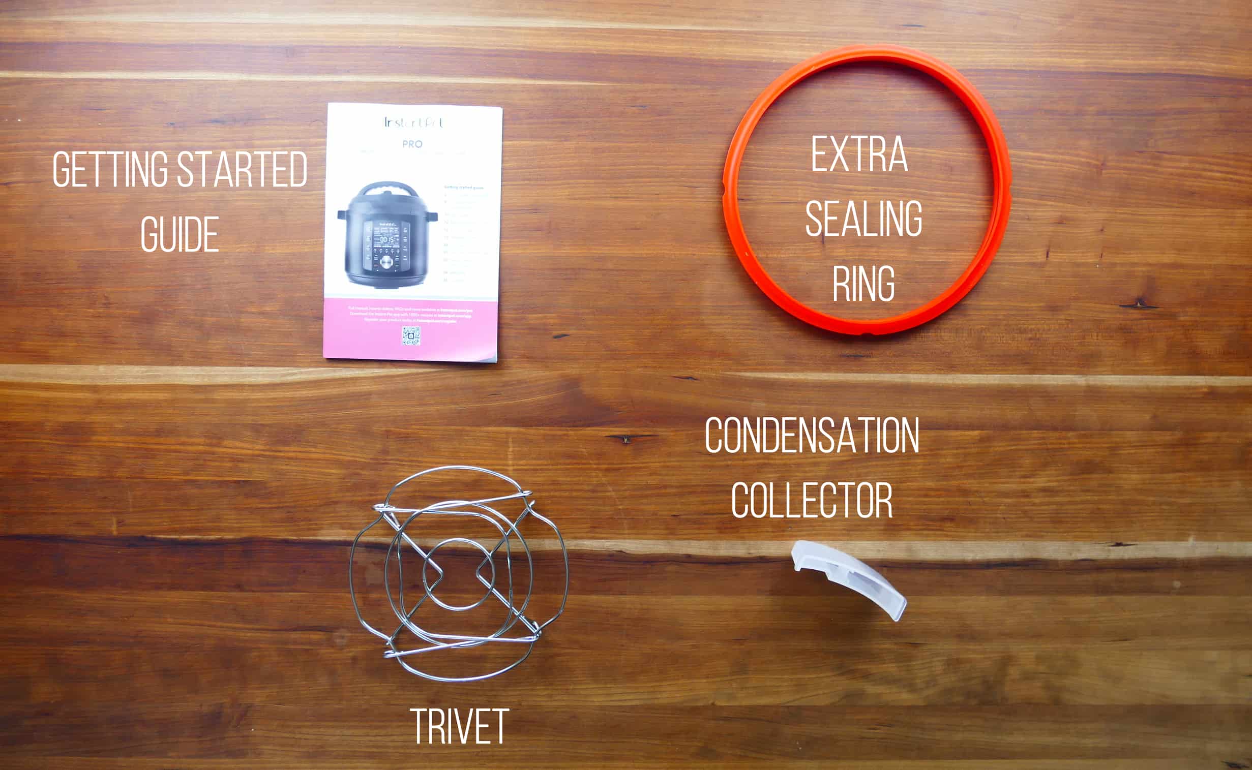 Instant Pot Pro Accessories - manual, red sealing ring, trivet, condensation collector