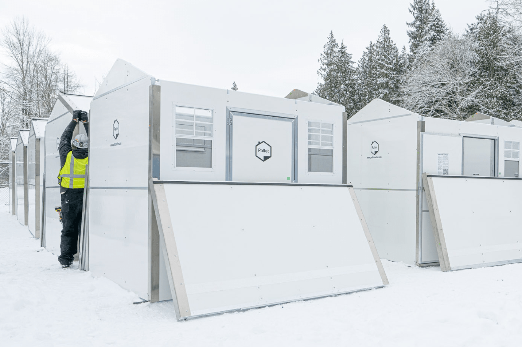 Pallet builds its 100th village Pallet Shelter