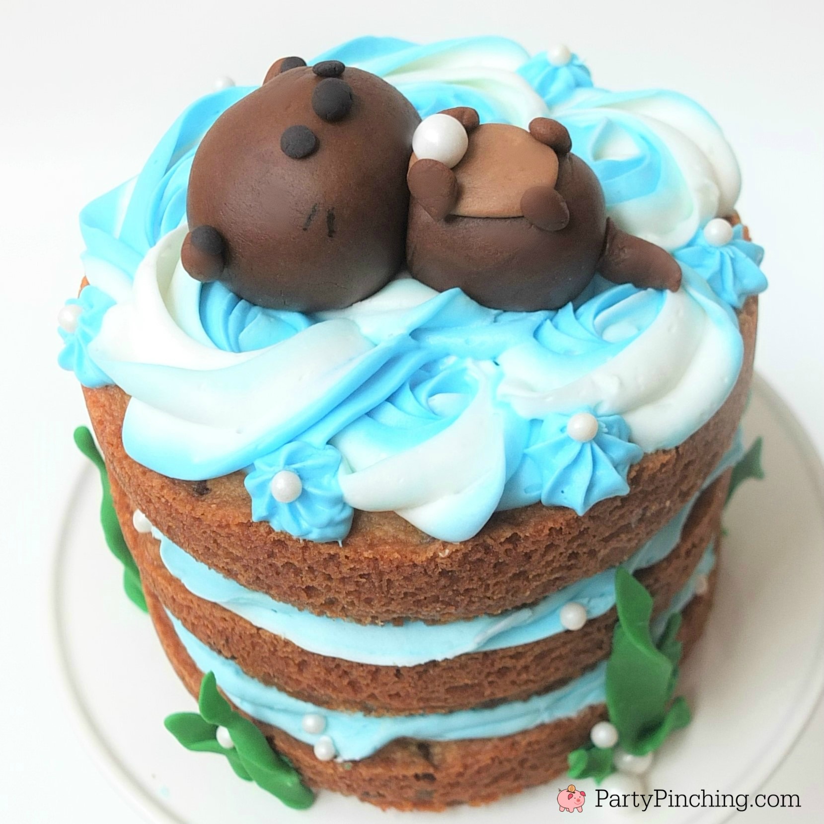 Sea otter cookie cake, cute fondant sea otter cake, easy animal cake ideas