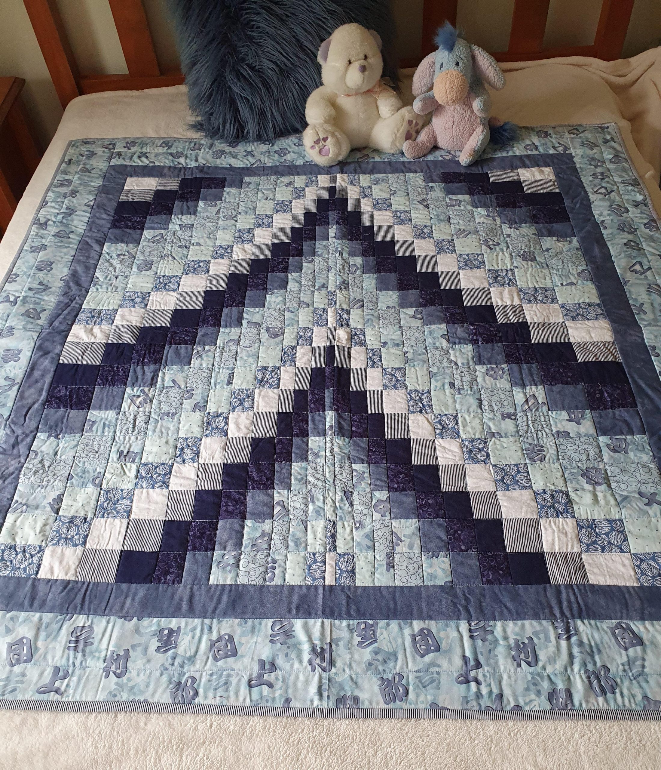 Blue Bargello Baby Quilt Blue Bargello Baby Quilt The Patchwork Quilt