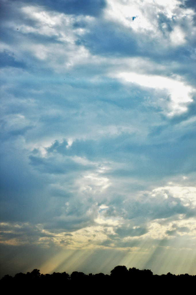 Rays of sun breaking through the clouds