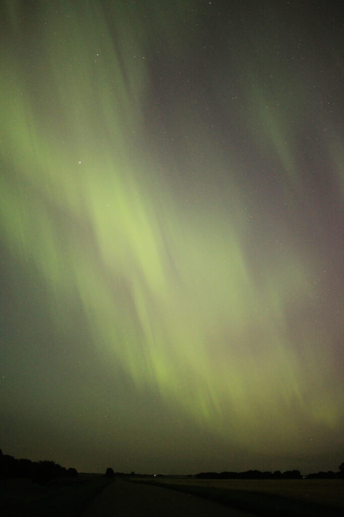 Aurora Borealis above the prairie - a cascade of green