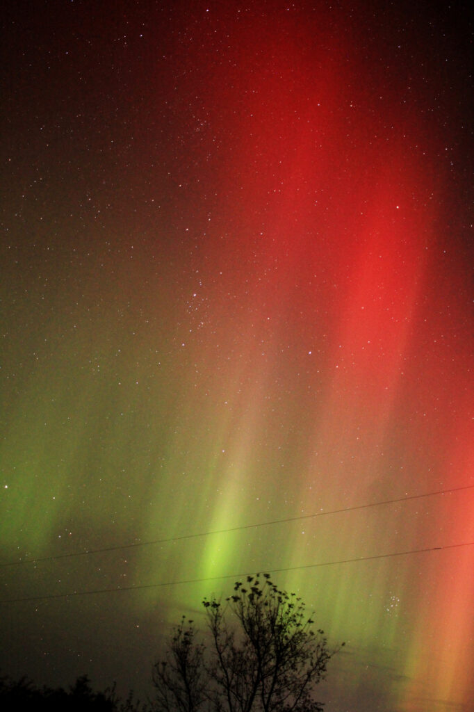 The aurora borealis, red above, green below