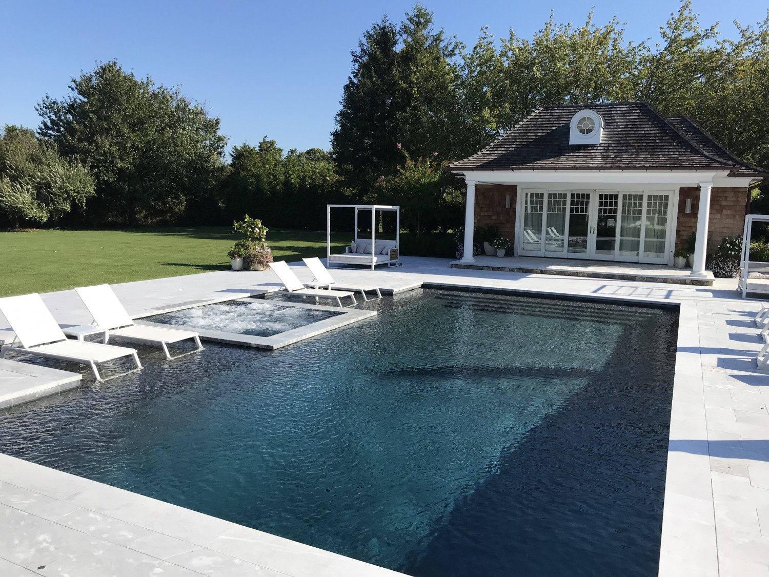 Walkout Sundecks Surrounding Spa & Pool in Water Mill Patricks Pools