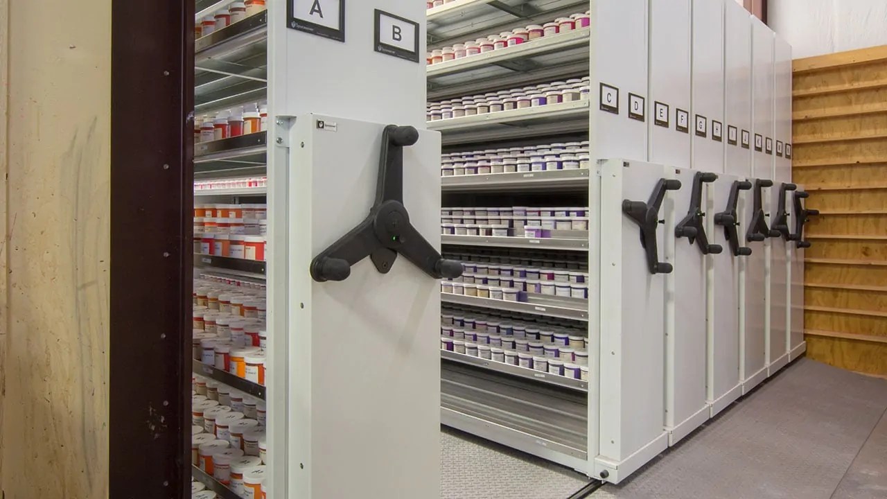 Compact Moveable Shelving System at One Stroke Inks
